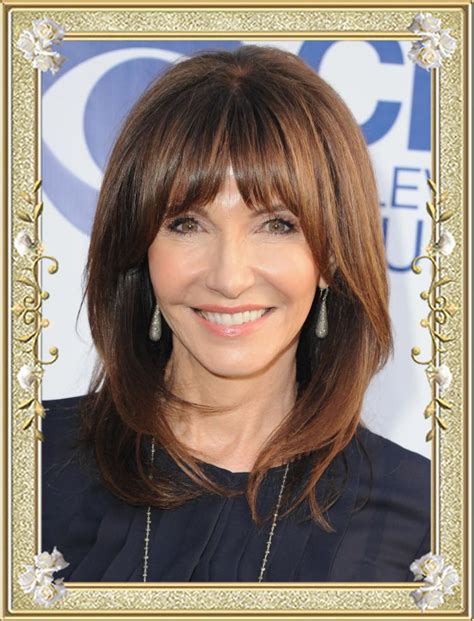 long hair with bangs over 50|haircuts with bangs for women over 50.